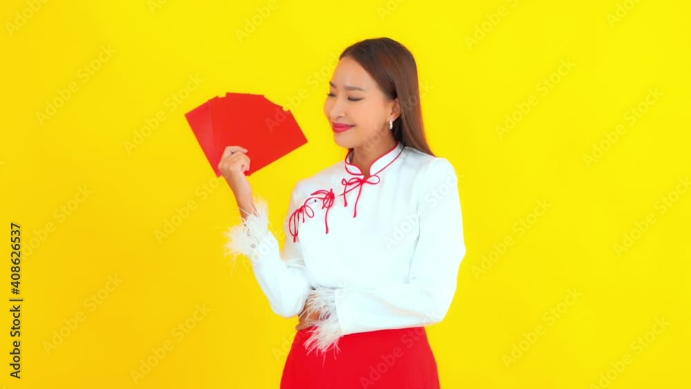 An attractive young woman holds a fan of cards available for composite. An attractive young woman holds a fan of cards available for composite.