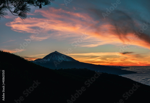 Sunset with a snowy mountain