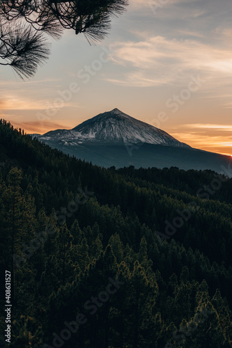 Sunset with a snowy mountain