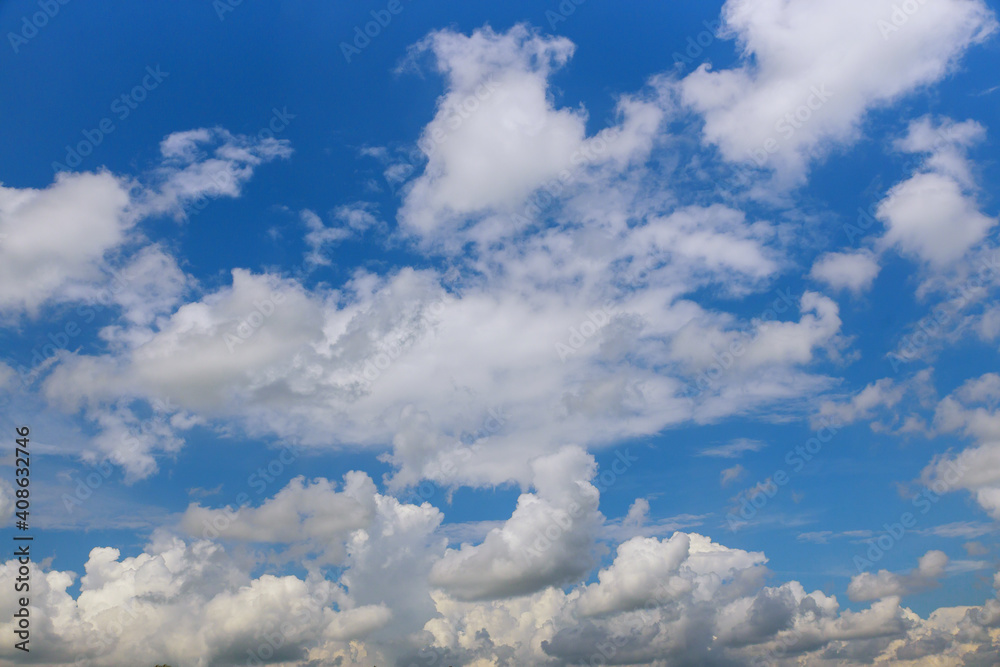 Blue sky with white clouds. Nature background.
