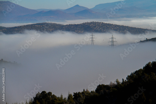 Clouds over the mountains, mist over the mountains, sky with clouds