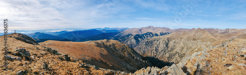 Spectacular panoramic view from the top of the mountain with different mountains in the background. Hiking, mountaineering. Balandrau mountain in Ripolles, Pirineus-Pyrenees Range, Catalunya, Spain.