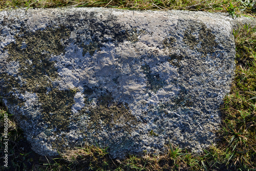 Weathered granite Cornwall lichen And grass