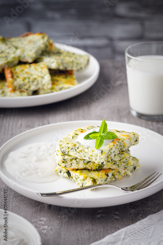 Casserole with cheese, zucchini and milk