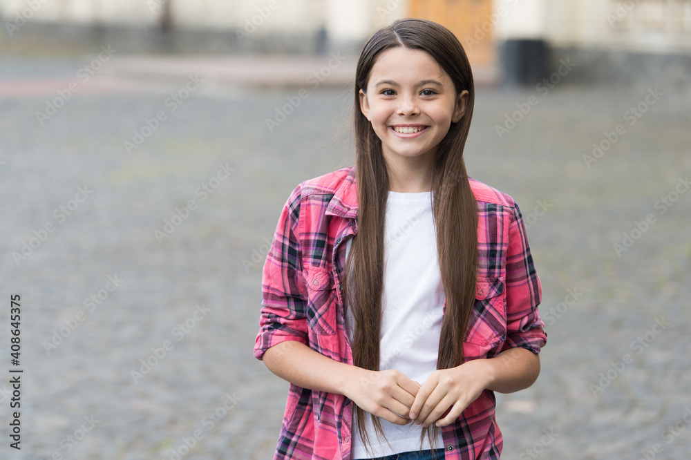 Fototapeta premium Happy child in casual style smile outdoors childrens day, november 20