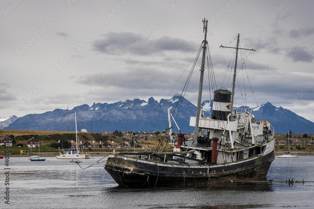 Historic St. Christopher shipwreck on shore at Ushuaia, Tierra del Fuego, Patagonia, Argentina Historic St. Christopher shipwreck on shore at Ushuaia, Tierra del Fuego, Patagonia, Argentina