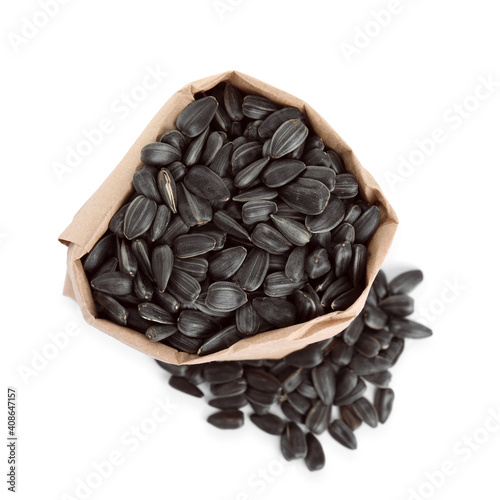 Sunflower seeds in bag on white background, top view
