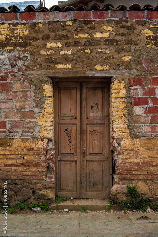 old wooden door of San Cristobal, Mexico