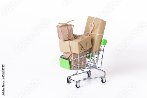 Shopping cart Filled With Many Boxes. Sales and Internet online shopping concept