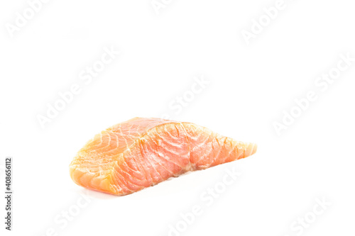 Close up of appetizing piece of red fish on white background
