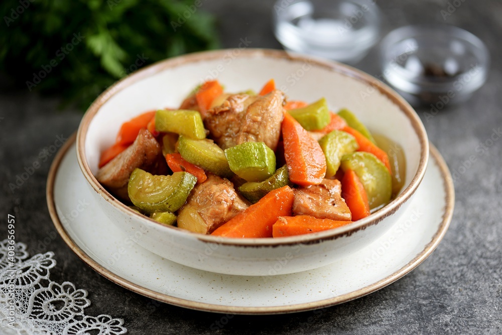 Turkey fillet with carrots, onions and zucchini. Healthly food.