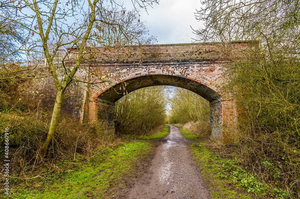 A view of a bridge over the Brampton Valley Way near Market Harborough, UK in Winter
