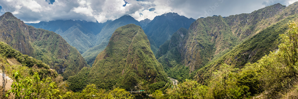 Panoramic shot of Urubamba river valley near Machu Picchu seen from trail, Peru