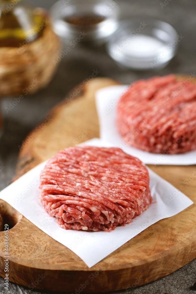 Fresh minced beef ready to cook cutlets. Fresh minced beef ready to cook cutlets.