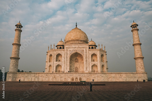 Taj Mahal east face against cloudy sky during sunrise time, Agra, India photo