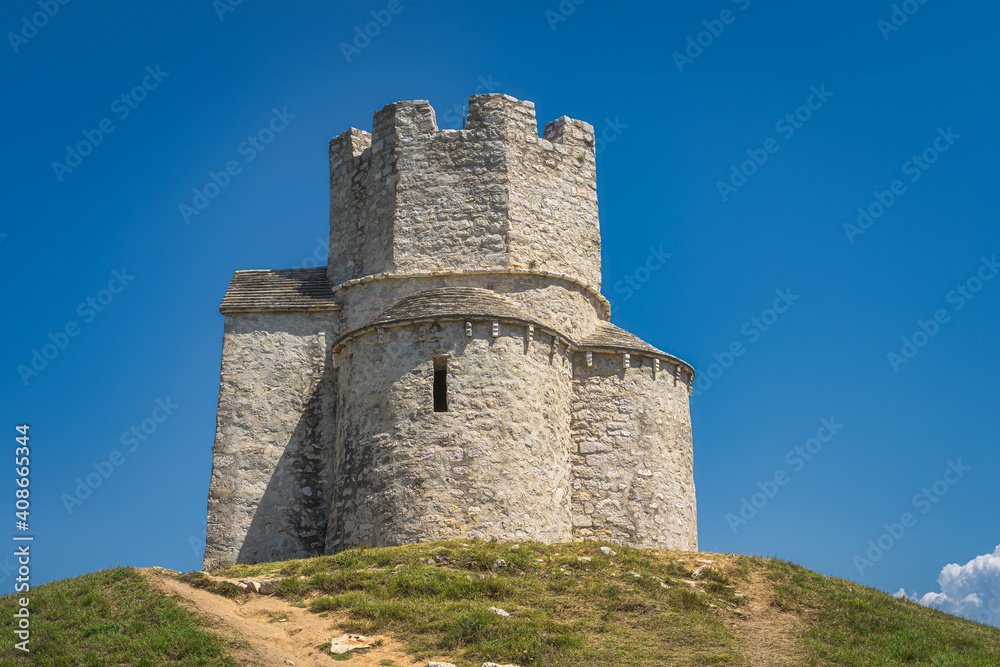 Closeup on small tower like, 11th century, St. Nicholas church situated on small hill, located between Nin and Zaton in Croatia
