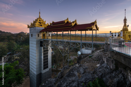 Elevator at Taung Kwe Pagoda against sky during sunset, Loikaw, Myanmar photo