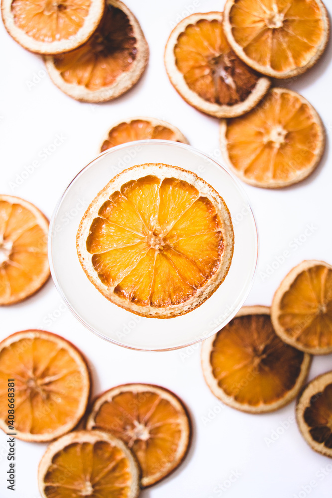 cocktail with orange slices on white background cocktail with orange slices on white background