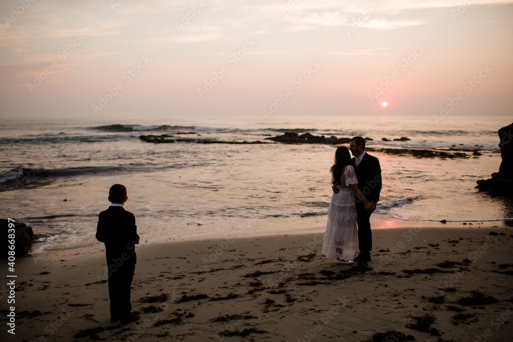Newlyweds & Nine Year Old Son Posing on Beach at Sunset in San Diego Newlyweds & Nine Year Old Son Posing on Beach at Sunset in San Diego
