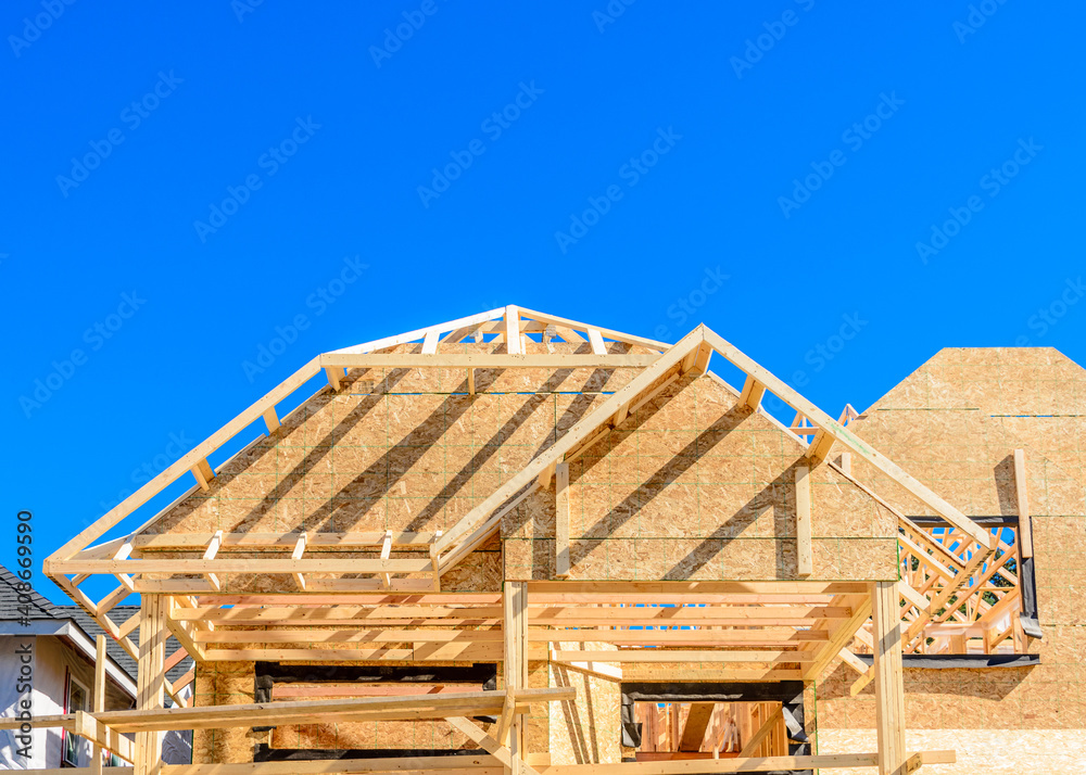 House under construction. The site with wooden frame. House under construction. The site with wooden frame.