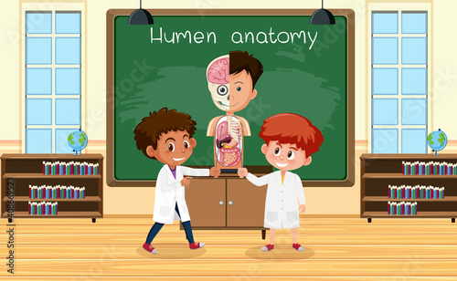 Young scientist explaining human anatomy in front of a board in laboratory