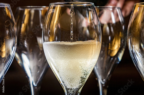 Prosecco being poured into a glass