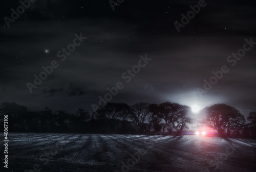 Lone driver in a dark field