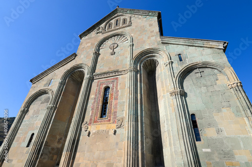 Back view of Svetitskhoveli Cathedral, located in Mtskheta, Georgia in the Caucasus. Orthodox Christian church. Medieval construction. photo