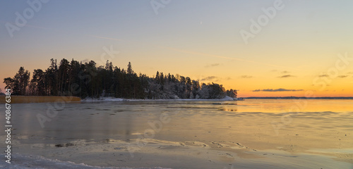Freezing sea at sunset in the archipelago near Turku Finland.