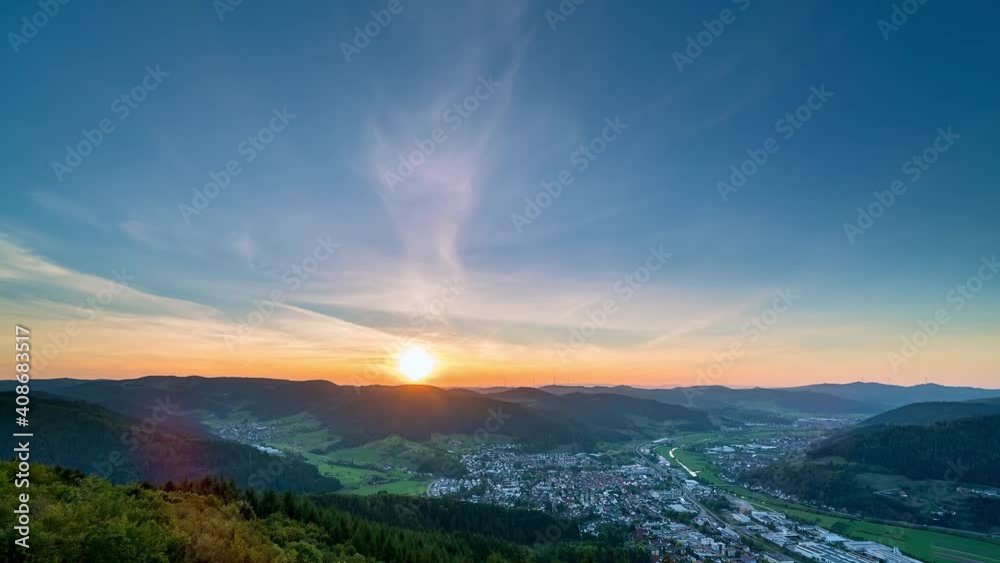 Time-lapse of German Black Forest mountain area scenery at sunset, mountain and village, day to night Time-lapse of German Black Forest mountain area scenery at sunset, mountain and village, day to night