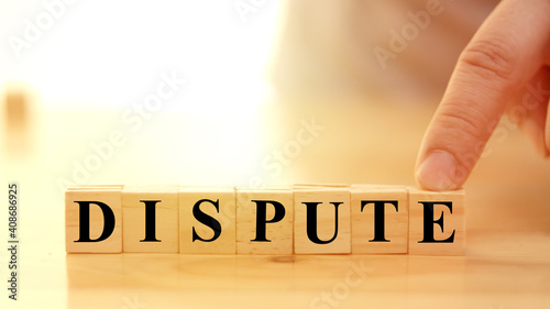 Dispute, text words typography written on wooden background, life and business motivational inspirational