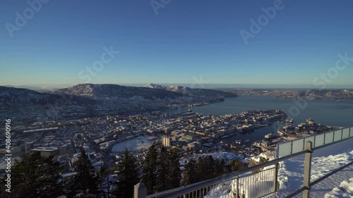 Motion shot walking along railings on mount Floyen, Beautiful view over Bergen City photo