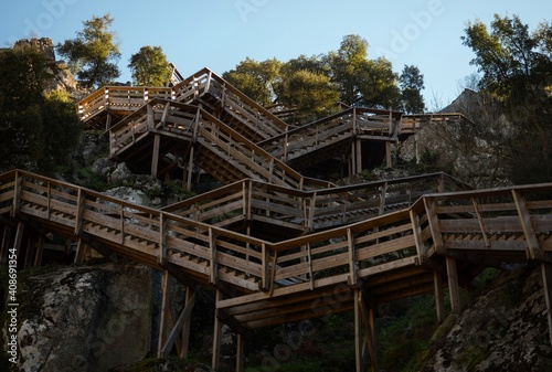 Aerial panorama of wooden walkway zigzag stairs staircase nature hiking trail path Passadicos do Paiva Arouca Portugal photo