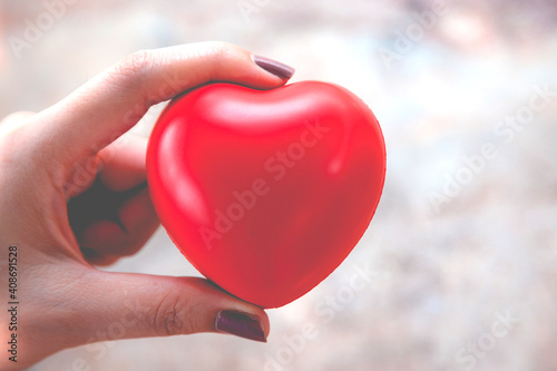 Woman hold red heart