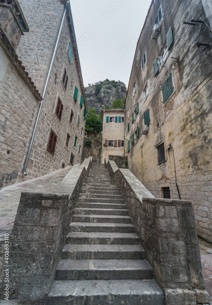 Kotor Old Town,steep ancient steps leading up into the surrounding mountains,Kotor municipality,Montenegro. Kotor Old Town,steep ancient steps leading up into the surrounding mountains,Kotor municipality,Montenegro.