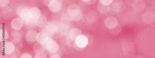 焦点がぼけたピンクの抽象的な背景 