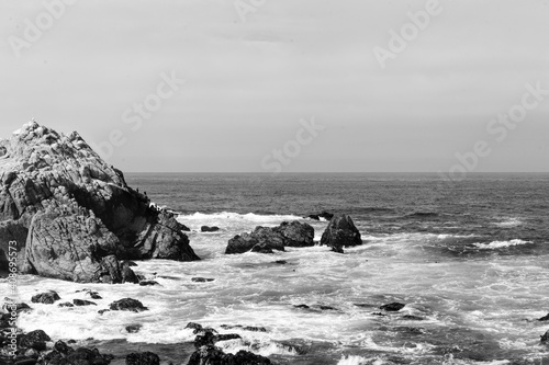 waves crashing on rocks