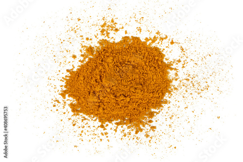 Turmeric powder spice pile isolated on white background. Top view.