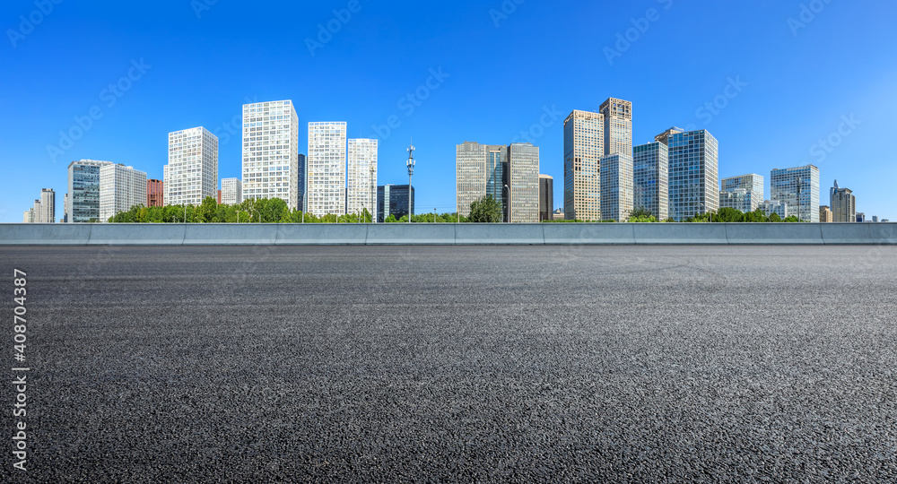 Asphalt road and modern city commercial buildings in Beijing,China. Asphalt road and modern city commercial buildings in Beijing,China.