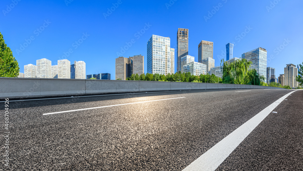 Asphalt road and modern city commercial buildings in Beijing,China. Asphalt road and modern city commercial buildings in Beijing,China.