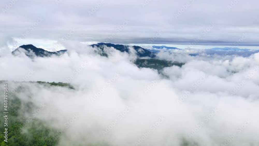 Hyper lapse video 4k, Aerial view Beautiful of morning scenery Golden light sunrise And the mist flows on high mountains Hyper lapse video 4k, Aerial view Beautiful of morning scenery Golden light sunrise And the mist flows on high mountains