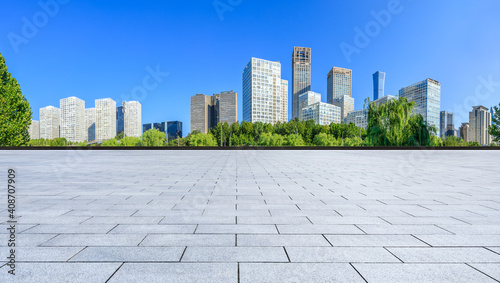 Fototapeta Naklejka Na Ścianę i Meble -  Empty square floor and modern city commercial buildings in Beijing,China.