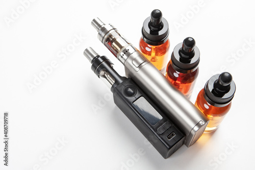 Vape pen next to smoking oi...