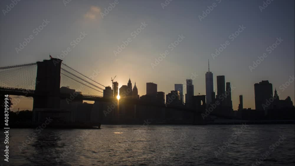 New York Timelapse With Brooklyn Bridge Going Through Sunset, Twilight And Night New York Timelapse With Brooklyn Bridge Going Through Sunset, Twilight And Night