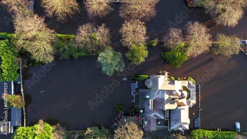 Top down drone shot of flooded roads and houses in cheshire due to storm christoph. photo