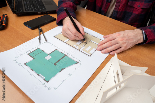 Hands of architect during w...