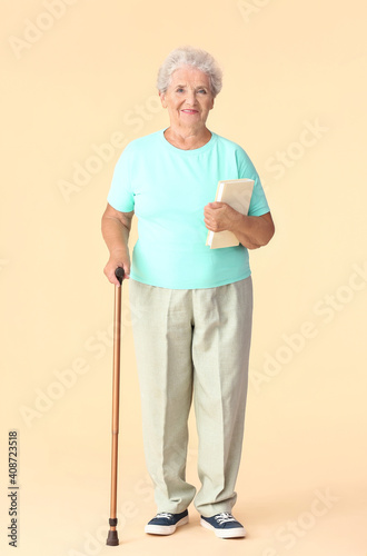 Senior woman with walking s...