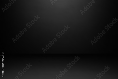 Empty black studio room background. Use as montage for product display © natrot