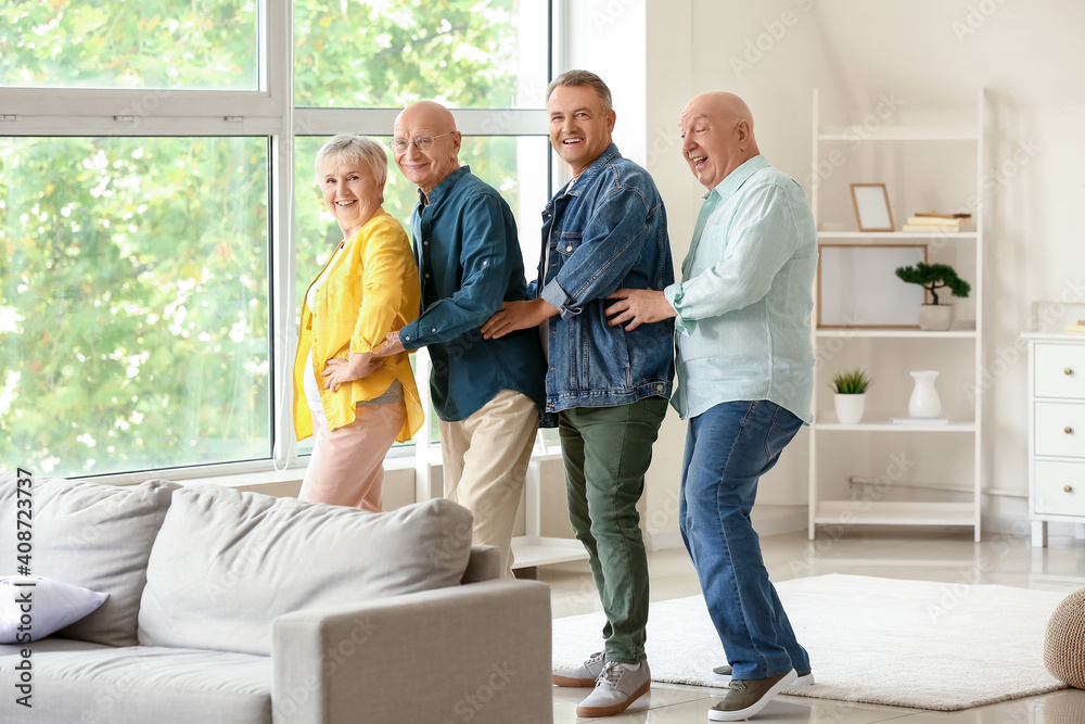 Senior people having fun at home Senior people having fun at home