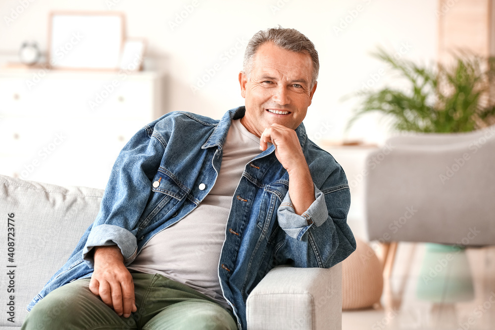 Portrait of senior man at home